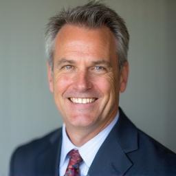 Professional headshot of Mark Jensen
